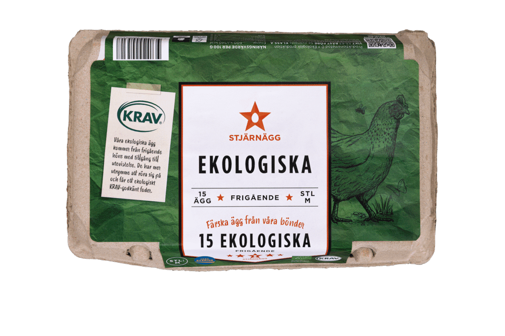En kartong med ekologiska ägg av märket Stjärnägg märkt Ekologiska, innehållande 15 ägg från frigående höns. På den grönvita förpackningen finns en illustration av en höna och KRAV:s logotyp för ekologisk certifiering.