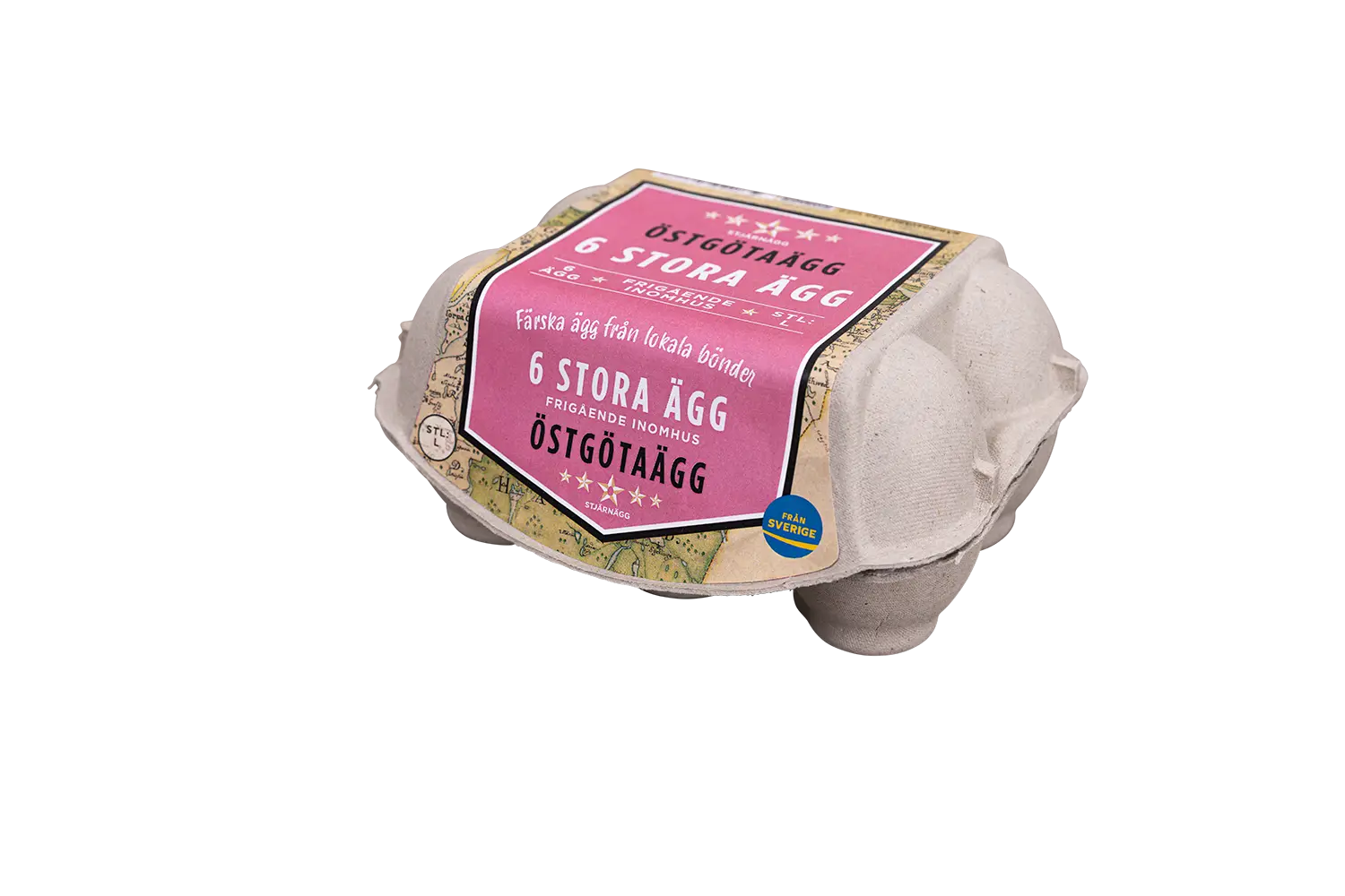 En kartong med sex stora ägg i en beige förpackning och en lila, vit och gul etikett på svenska med texten 6 stora ägg och Östgötaägg.