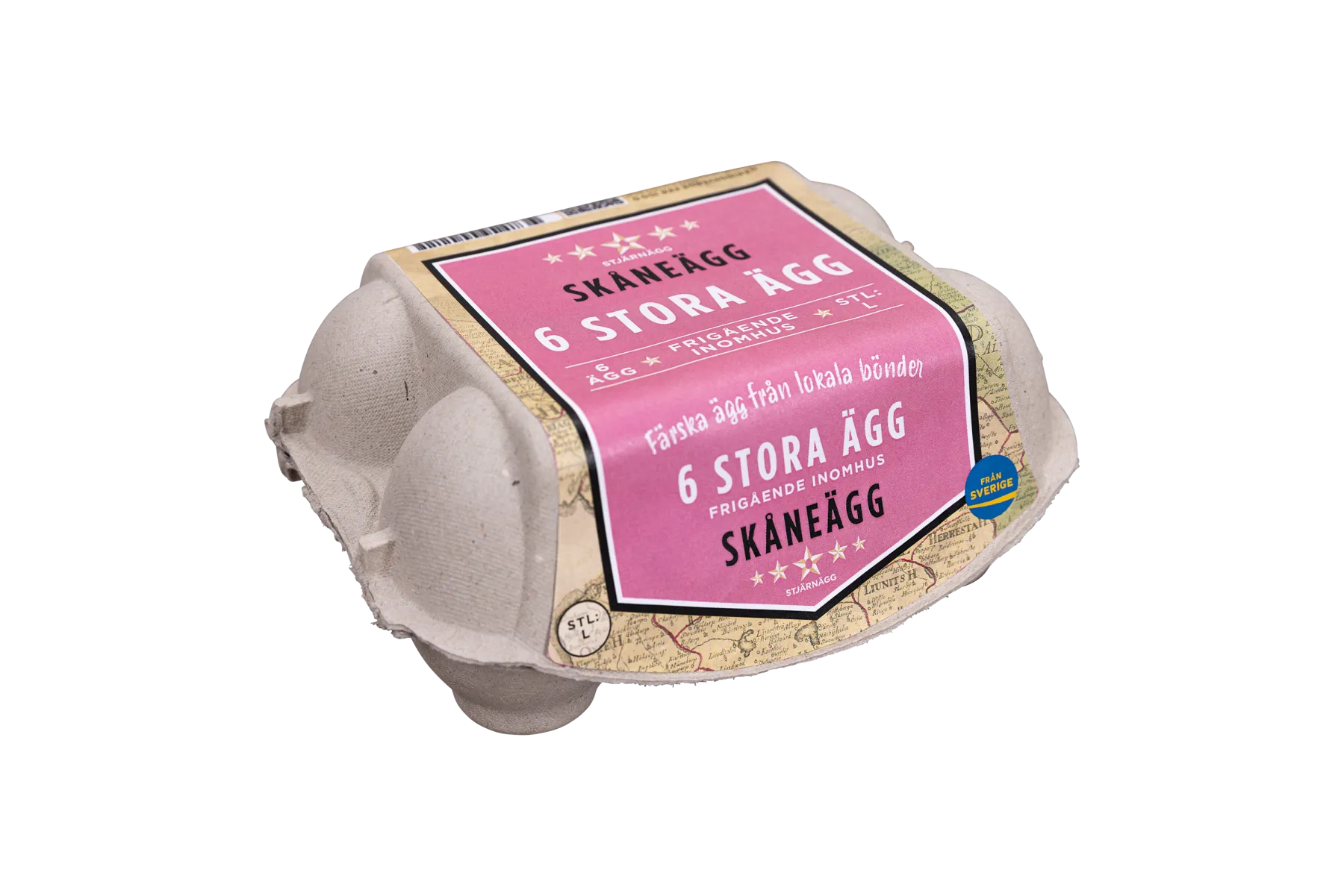 En kartong med Skåneägg som innehåller 6 stora ägg, med en rosa och beige etikett på svenska som anger att de är färska, närproducerade och frigående.