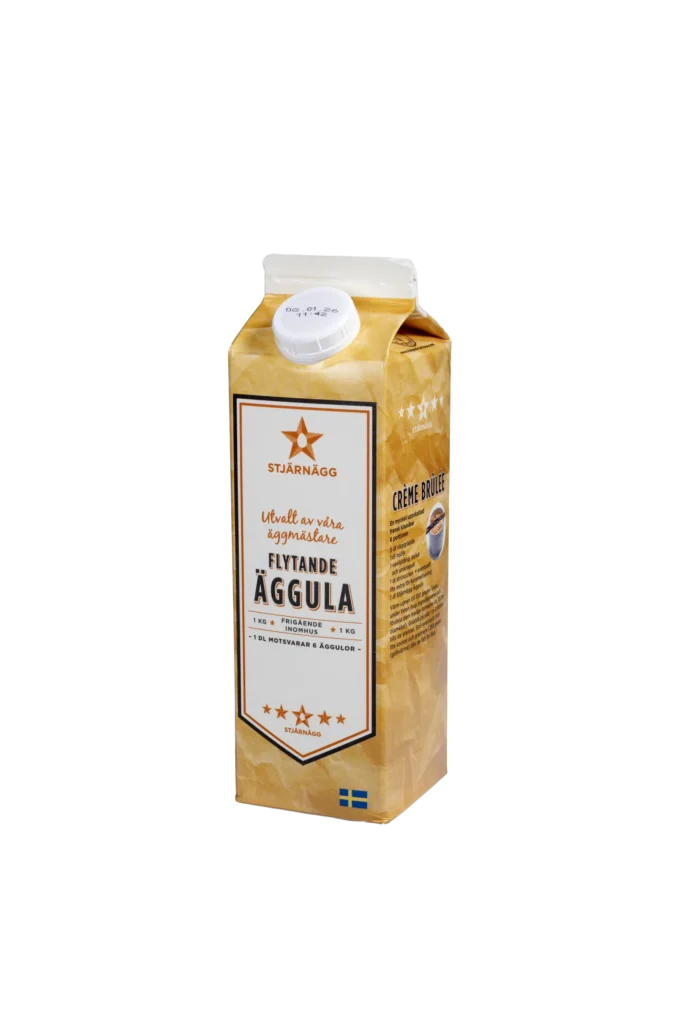 En kartong med Stjärnägg Flytande Äggula, en svensk flytande ägguleprodukt, med gul design, vitt lock och svensk flagga i botten.